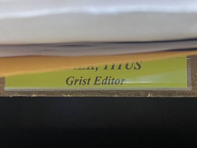A close up of the words "Grist Editor" labelling a mail box at the University of Tennessee.